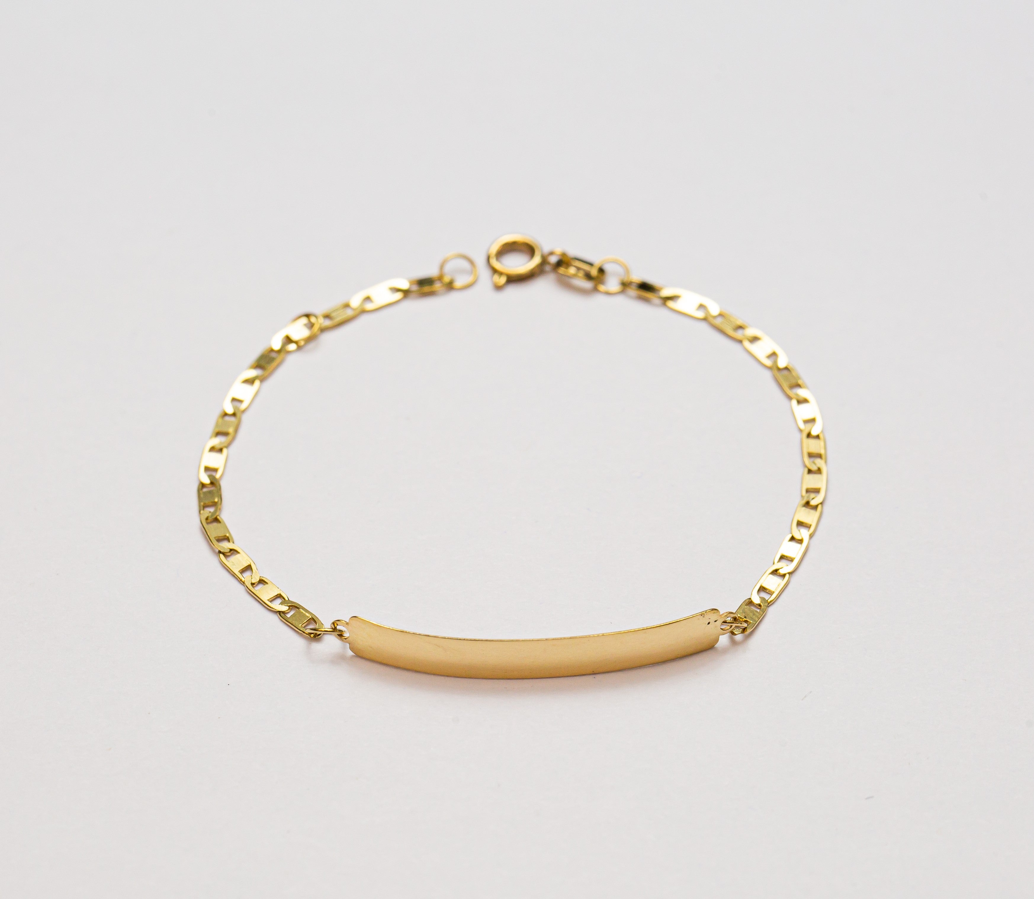 Pulsera infantil con Plaquita