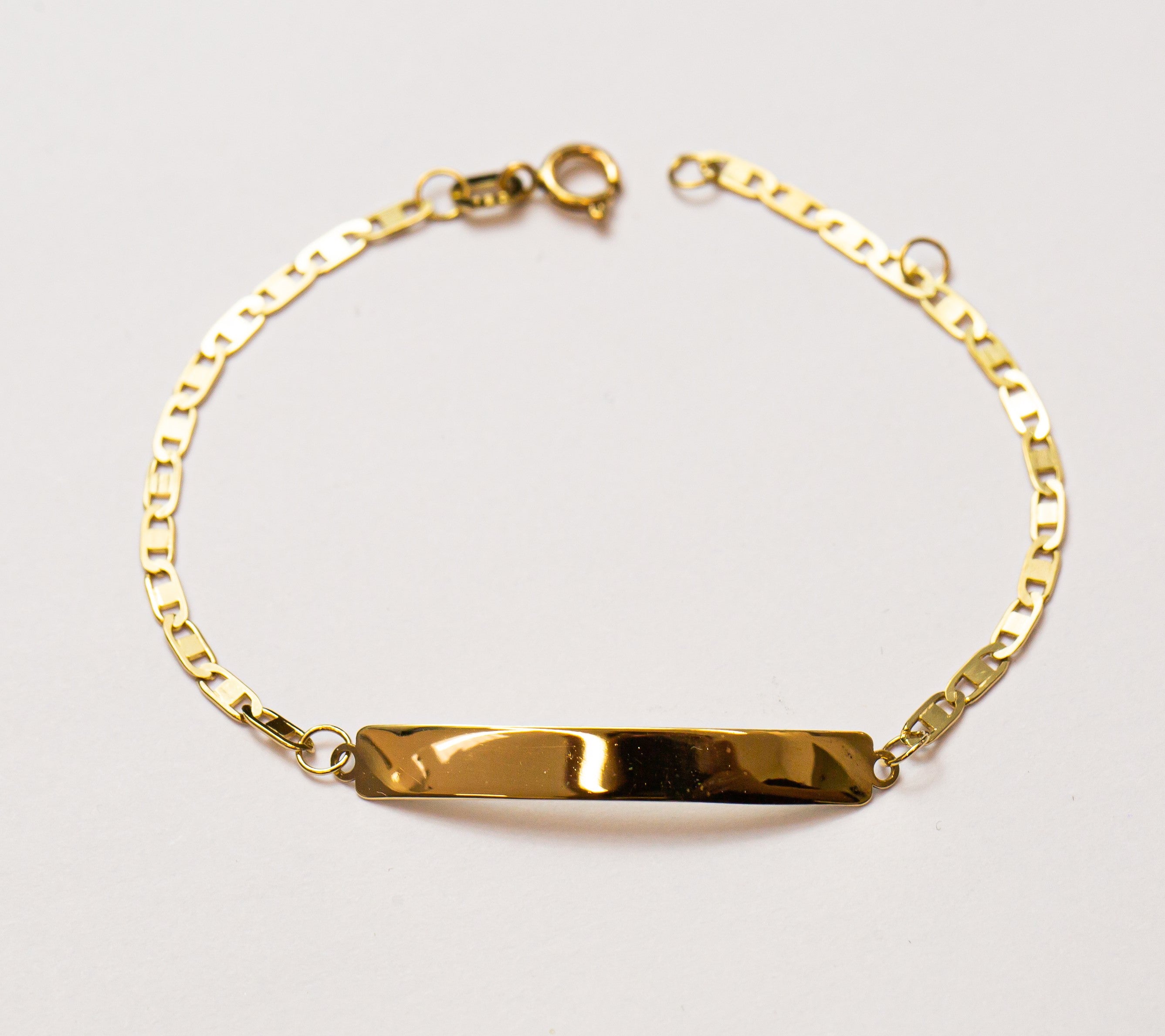 Pulsera infantil con placa