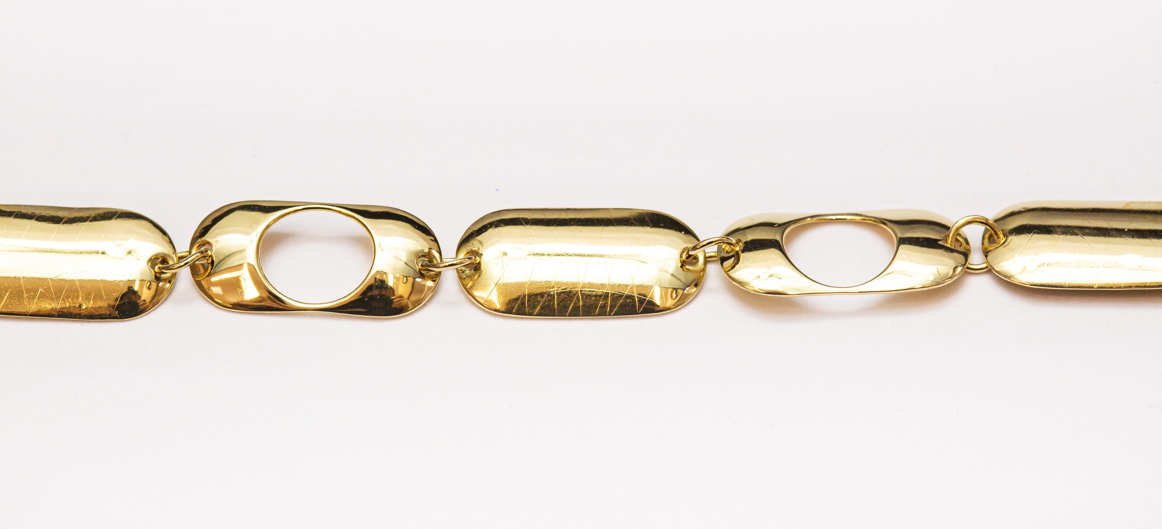 Pulsera de oro macizo de 18 quilates con eslabones de píldora