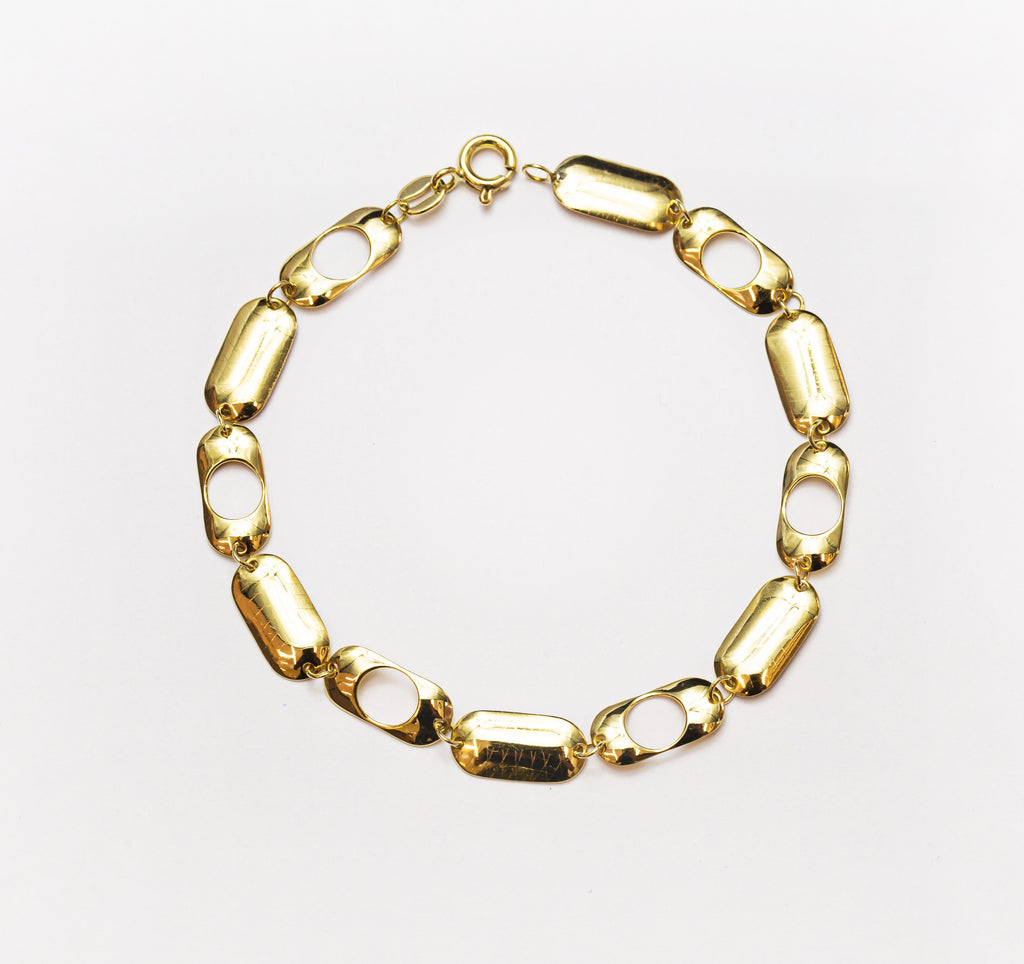 Pulsera de oro macizo de 18 quilates con eslabones de píldora
