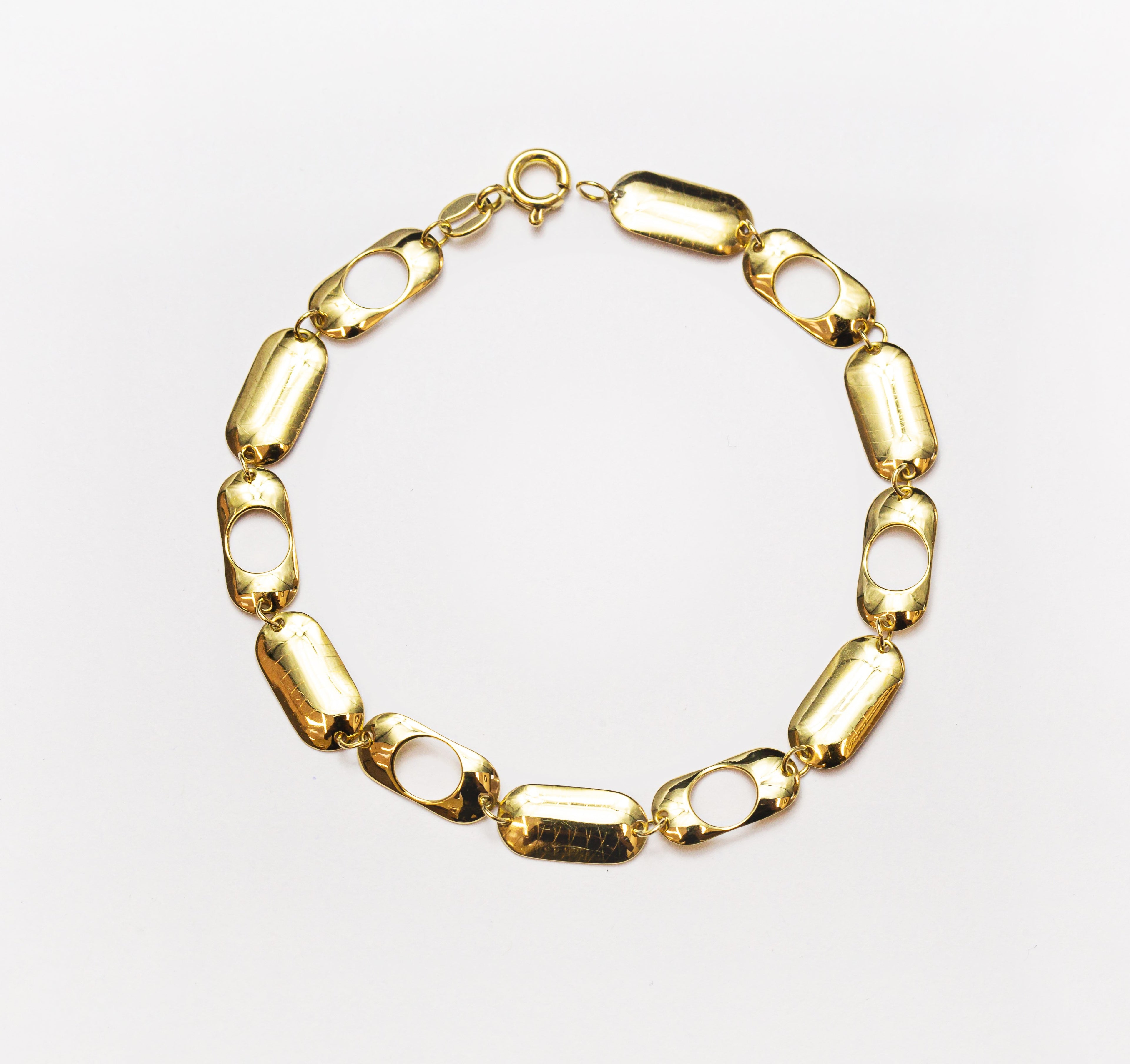 Pulsera de oro macizo de 18 quilates con eslabones de píldora
