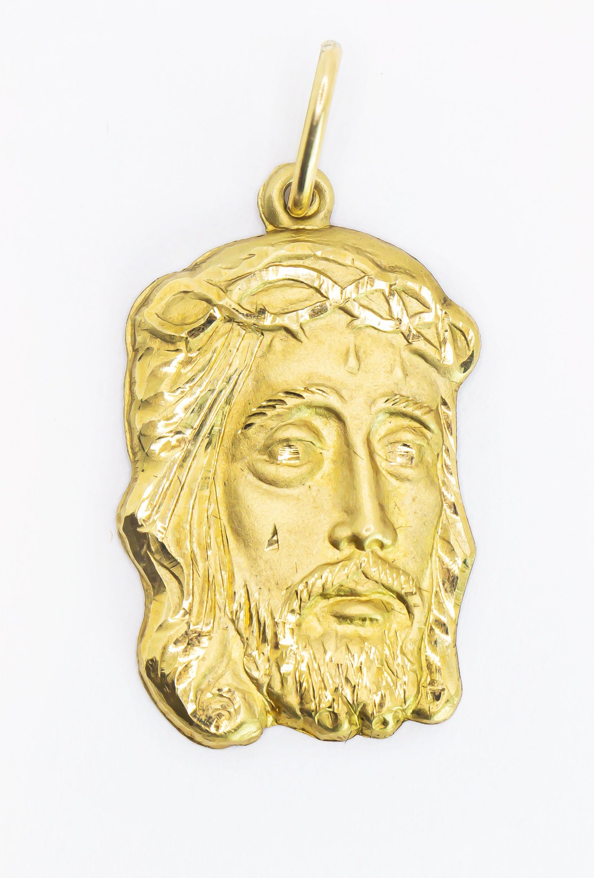 Colgante de oro macizo de 18 quilates con el rostro de Cristo