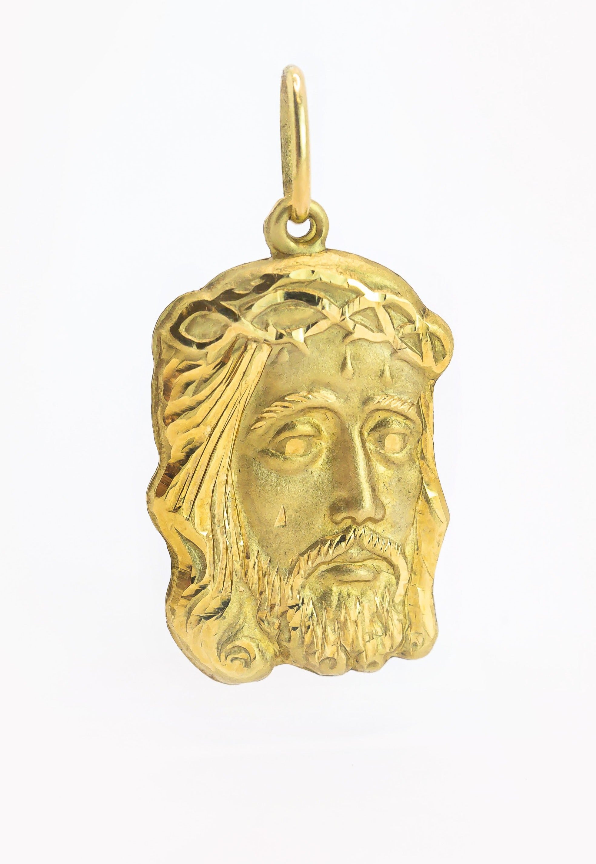 Colgante de oro macizo de 18 quilates con el rostro de Cristo