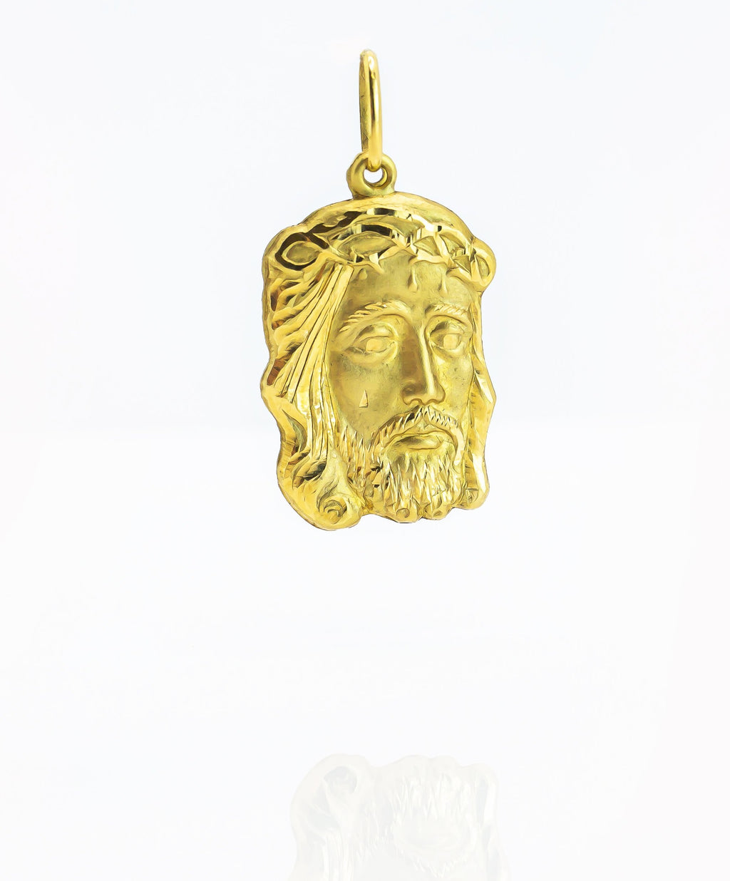 Colgante de oro macizo de 18 quilates con el rostro de Cristo
