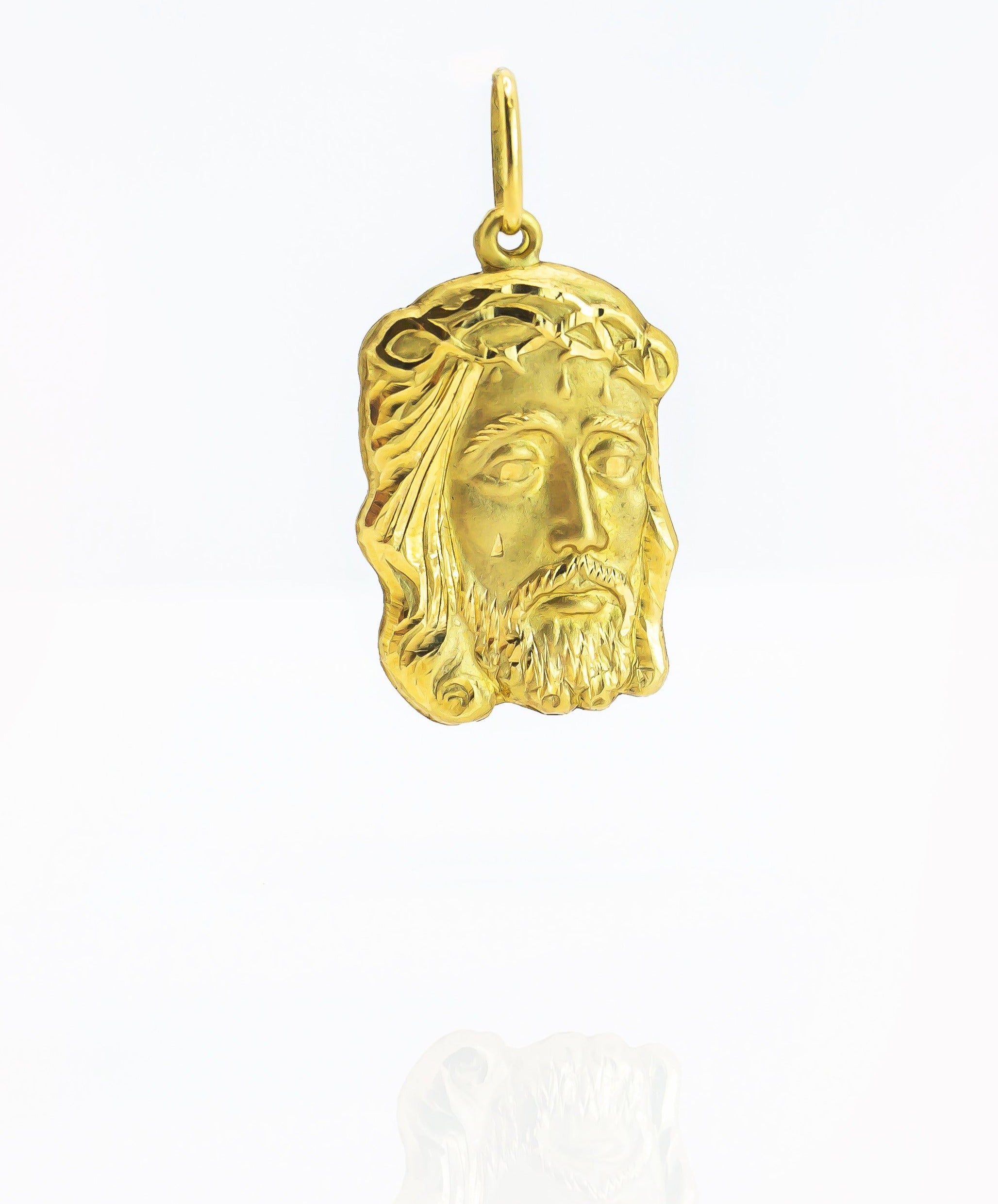 Colgante de oro macizo de 18 quilates con el rostro de Cristo