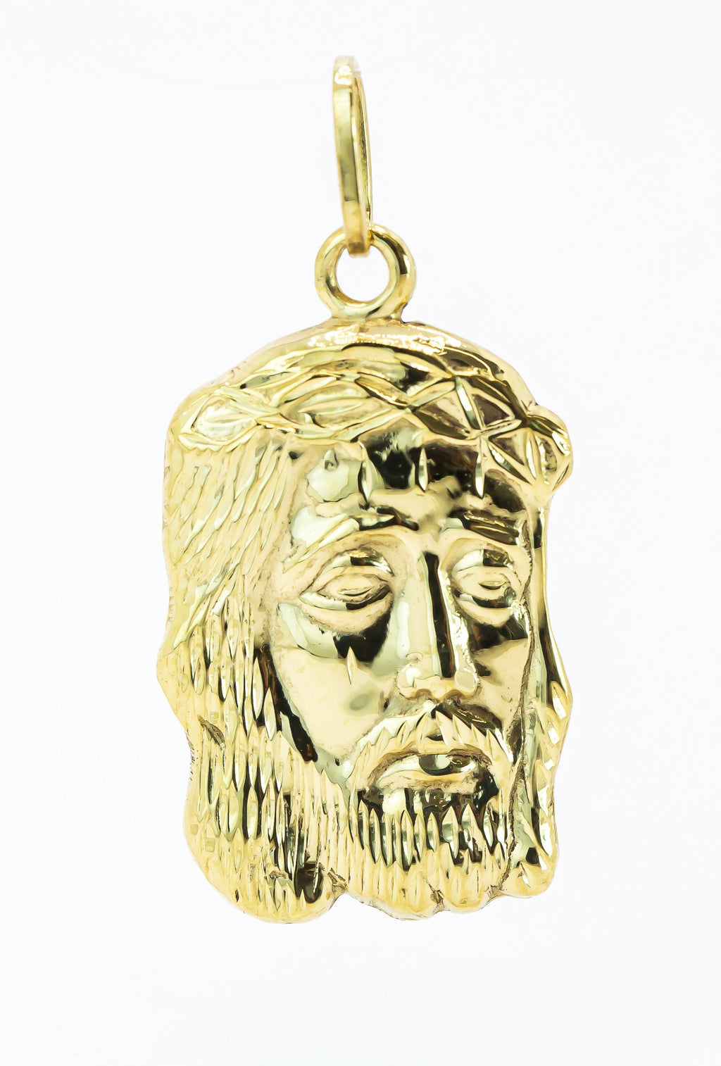 Colgante de oro macizo de 18 quilates con el rostro de Cristo