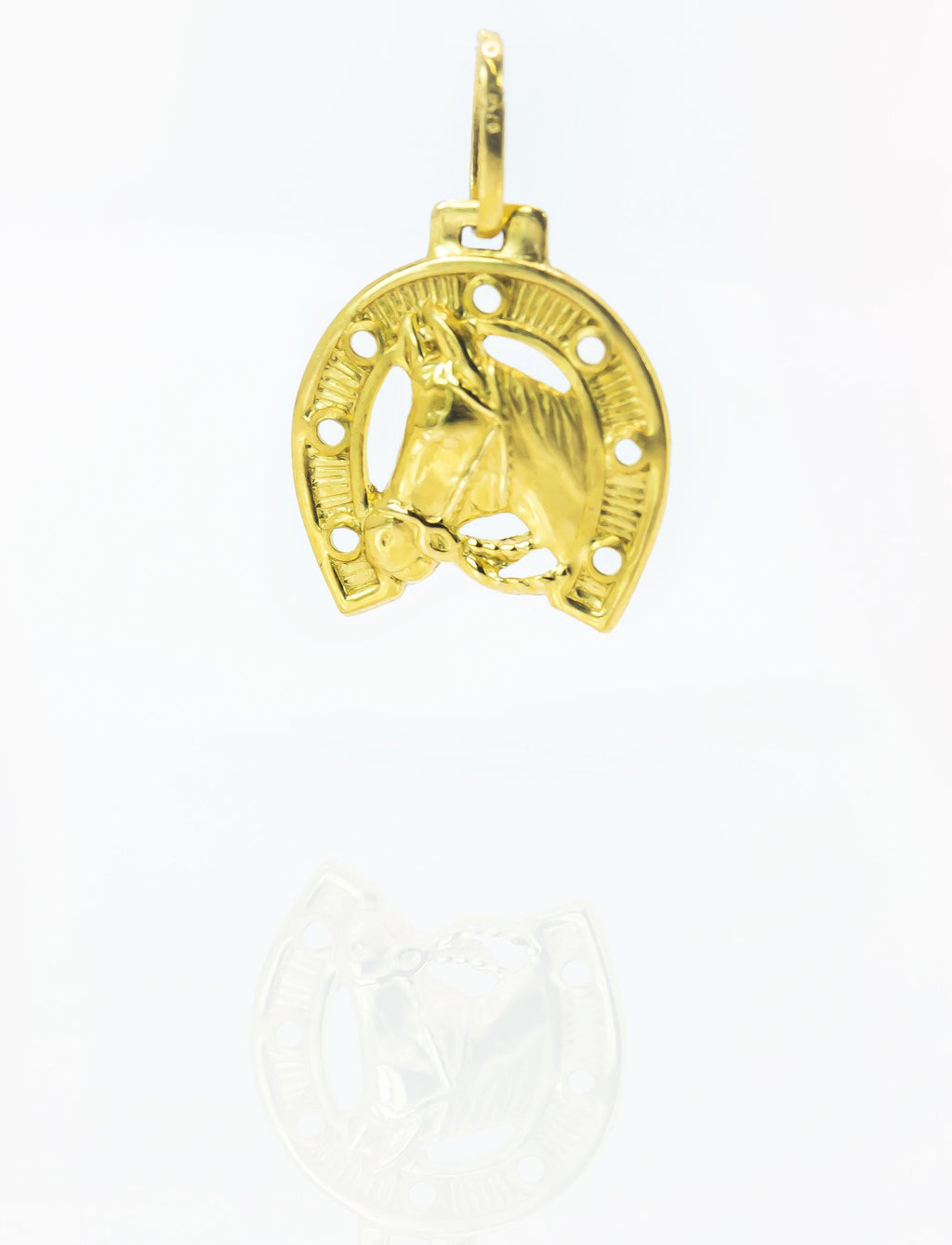 Colgante de oro macizo de 18 quilates con herradura